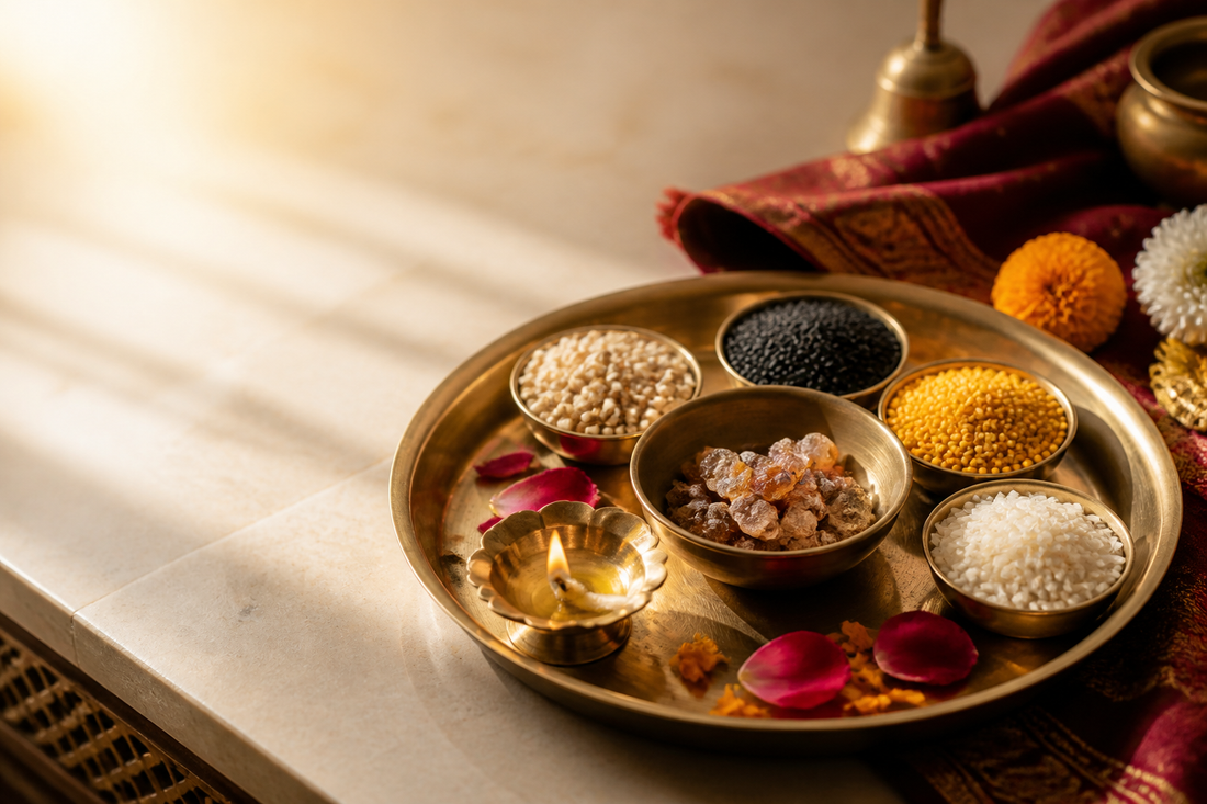 Havan samagri on a brass thali with guggul, grains, sesame and diya